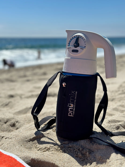 Close-up of black pnümix Sling Bag with logo, displayed as a holiday gift—perfect for powersports, RV trips, and outdoor parties. Lightweight, waterproof, and designed to keep your cocktail mixer and essentials organized on the go. Lets see Barsys, Bartesian, or FlasKap do that!!