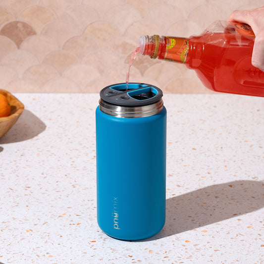 Close-up of pnümix Extra Magazine—vacuum-sealed, stainless steel drinkware accessory for portable cocktail mixers. The essential add-on for outdoor adventures, group gatherings, and hosting; easily mix and serve multiple custom drinks without pods or premade cocktails.